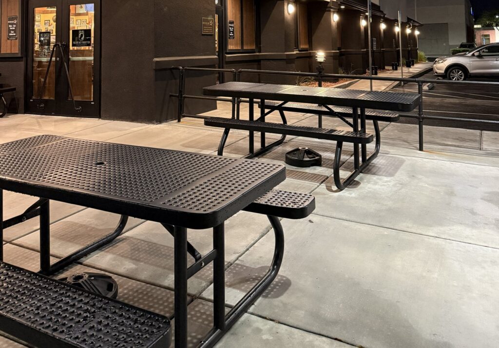 Mission BBQ perforated picnic tables on the patio
